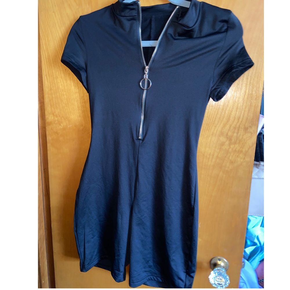 Black Romper. One piece.